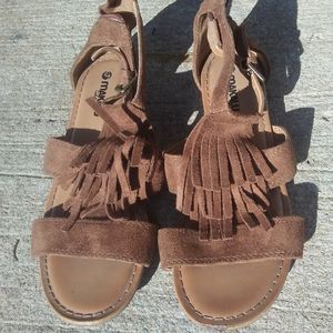 Brown Makalu faux leather sandals.